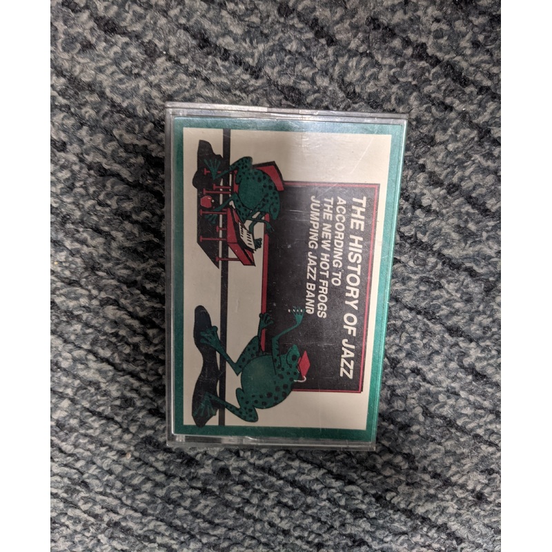 New Hot Frogs Jumping Jazz Band, The  The History Of Jazz According To The New Hot Frogs Jumping Jazz Band Volume XI Cassette *Used 1993 Release*