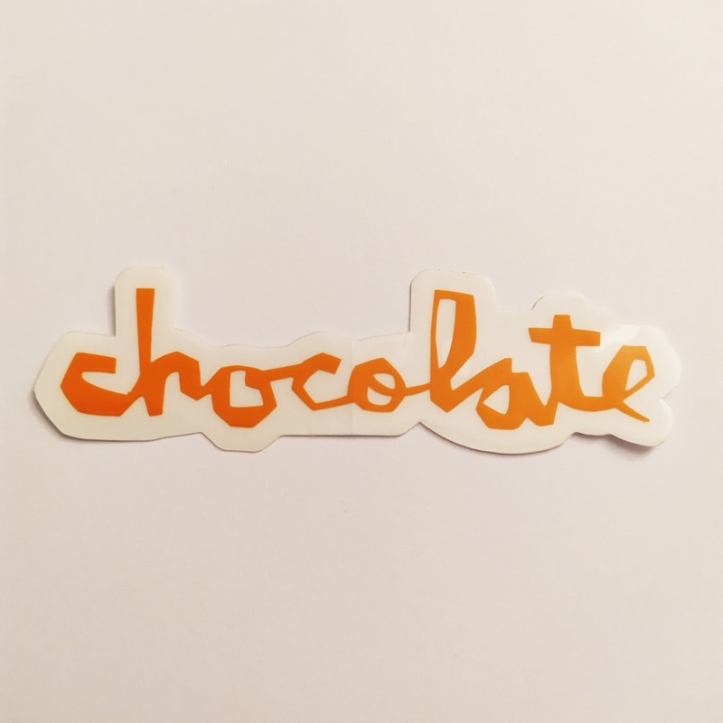 Chocolate Chunk Logo Skateboard Sticker – Orange – 14 cm across approx.